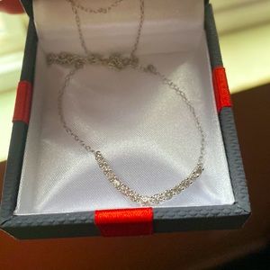 Lab made white sapphire diamonds, with sterling silver necklace 18” in